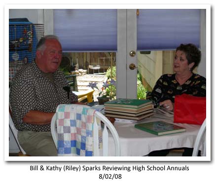 Bill Curren and Kathy Reviewing High School Annual