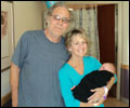 Jim and Carol Canfield and new grandson Chaz